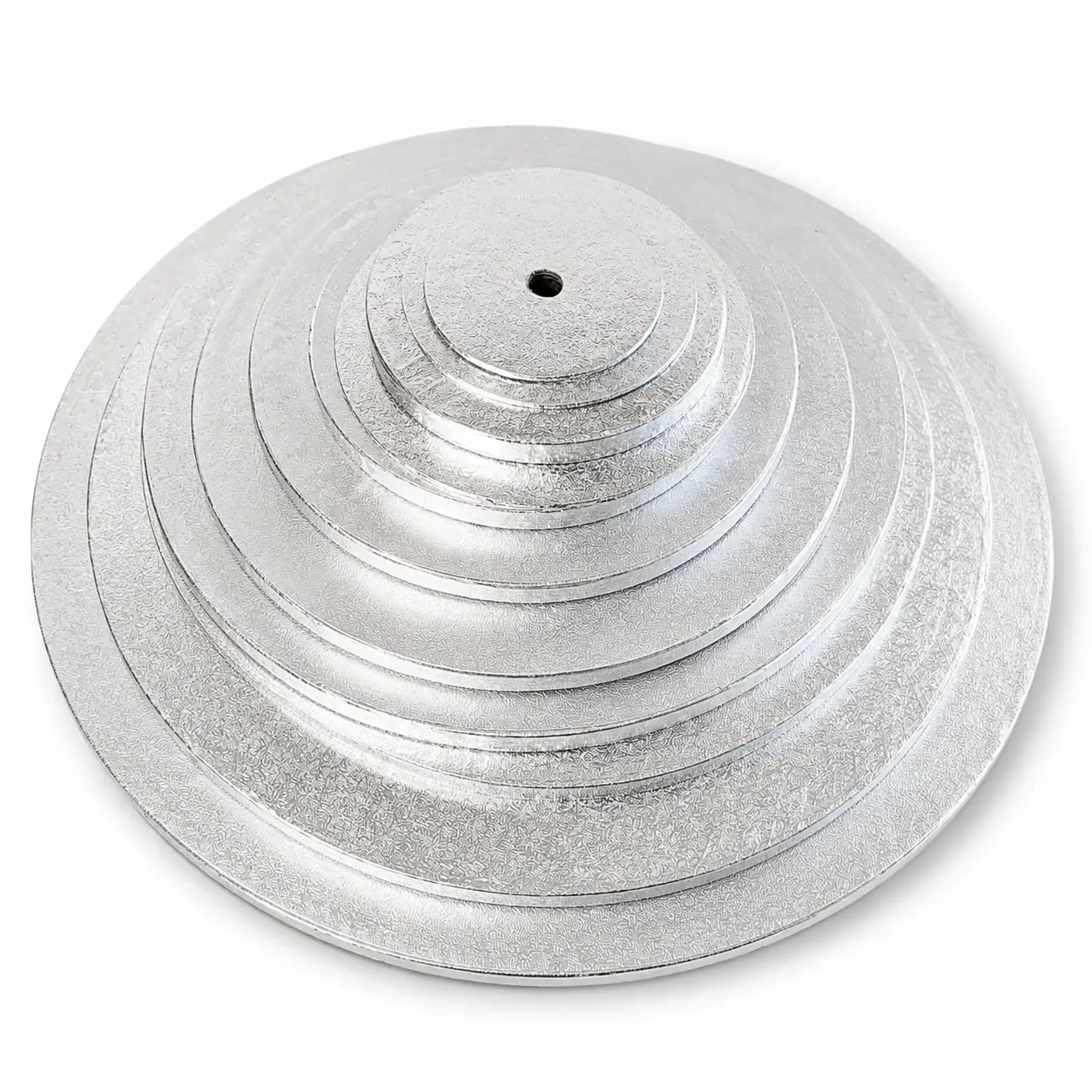Round silver foil cake cards in graduated sizes, stacked to show the range, each with the centre hole pre-cut